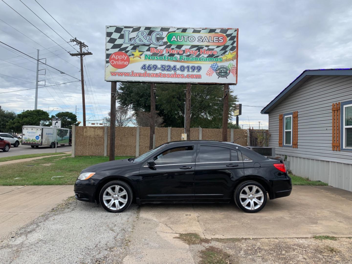 2012 Black /Black Chrysler 200 LX (1C3CCBAB3CN) with an 2.4L L4 DOHC 16V engine, Automatic transmission, located at 1830 North Belt Line Road, Irving, TX, 75061, (469) 524-0199, 32.834373, -96.993584 - Photo#0